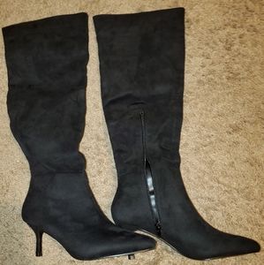 Brand new knee high boots.